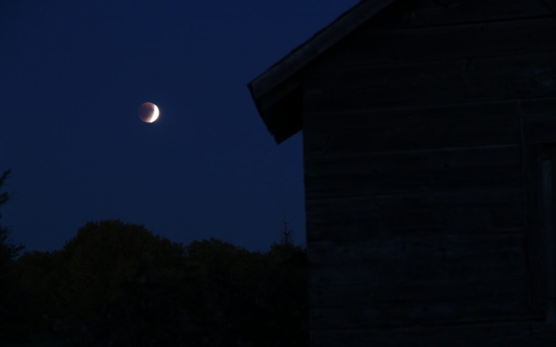 Reflecting under a lightly-eclipsed moon